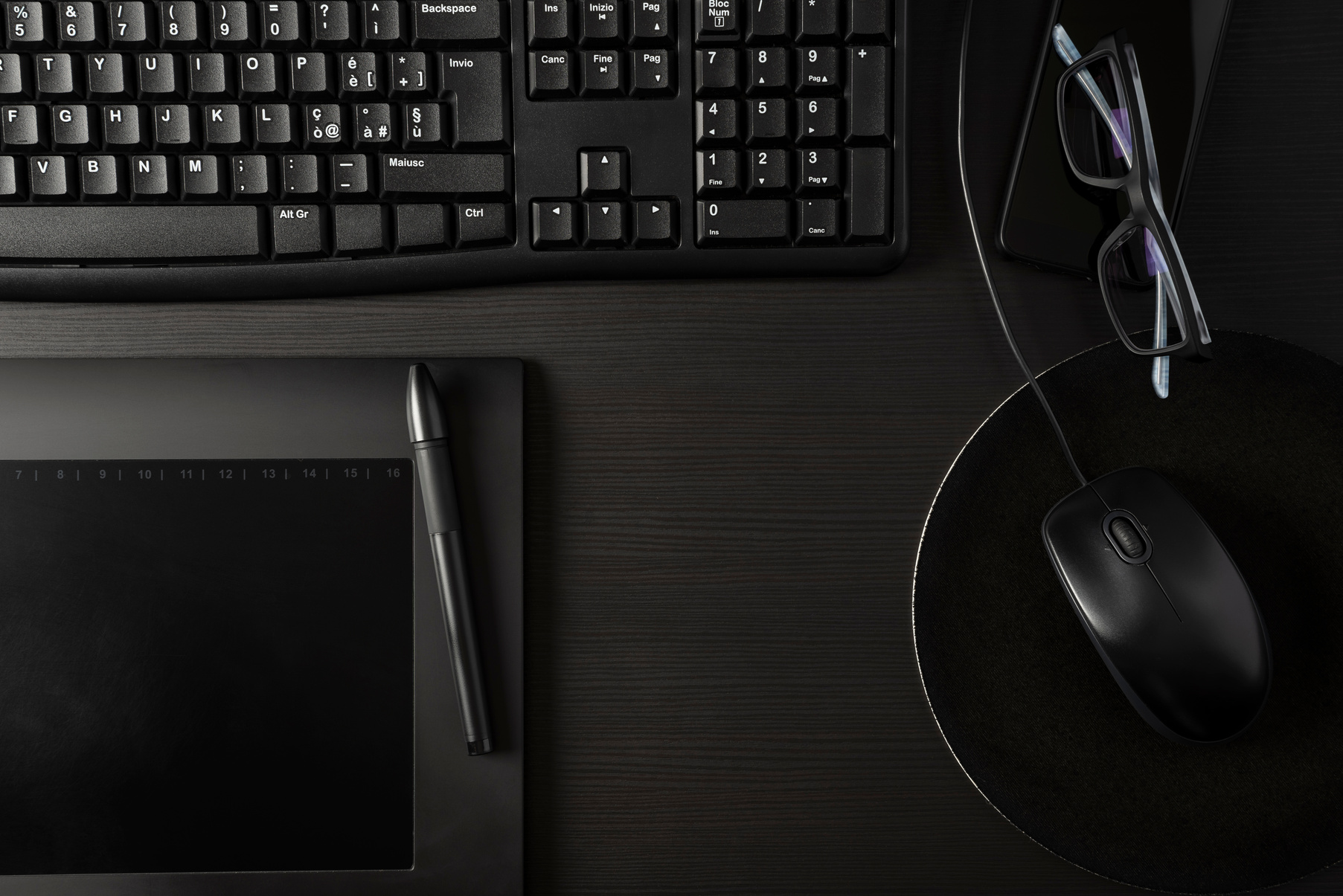 Black desk with computer